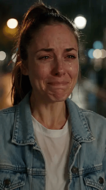 The rainy-street AI crying video: after the tears she turns and walks away down the shining wet street