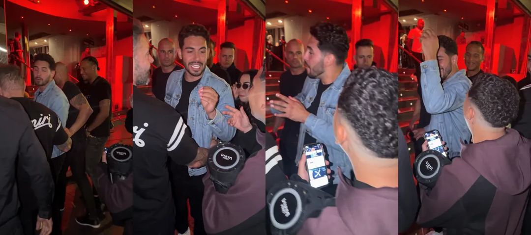 Cuatro momentos de un clip Dame Hombro AI: la entrada entre la multitud, el cara a cara, la respuesta, la celebración con una mano en la cabeza
