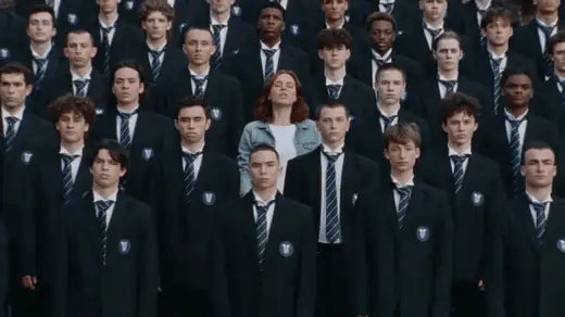 The peak of the Storm trend: the crowd of students bows, then throws their heads back, while the lead in a denim jacket stands still in the middle